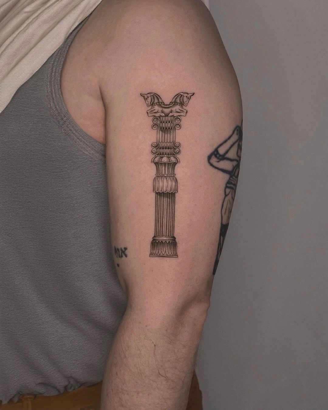 Fine line pillar arm tattoo at XOXO Dublin