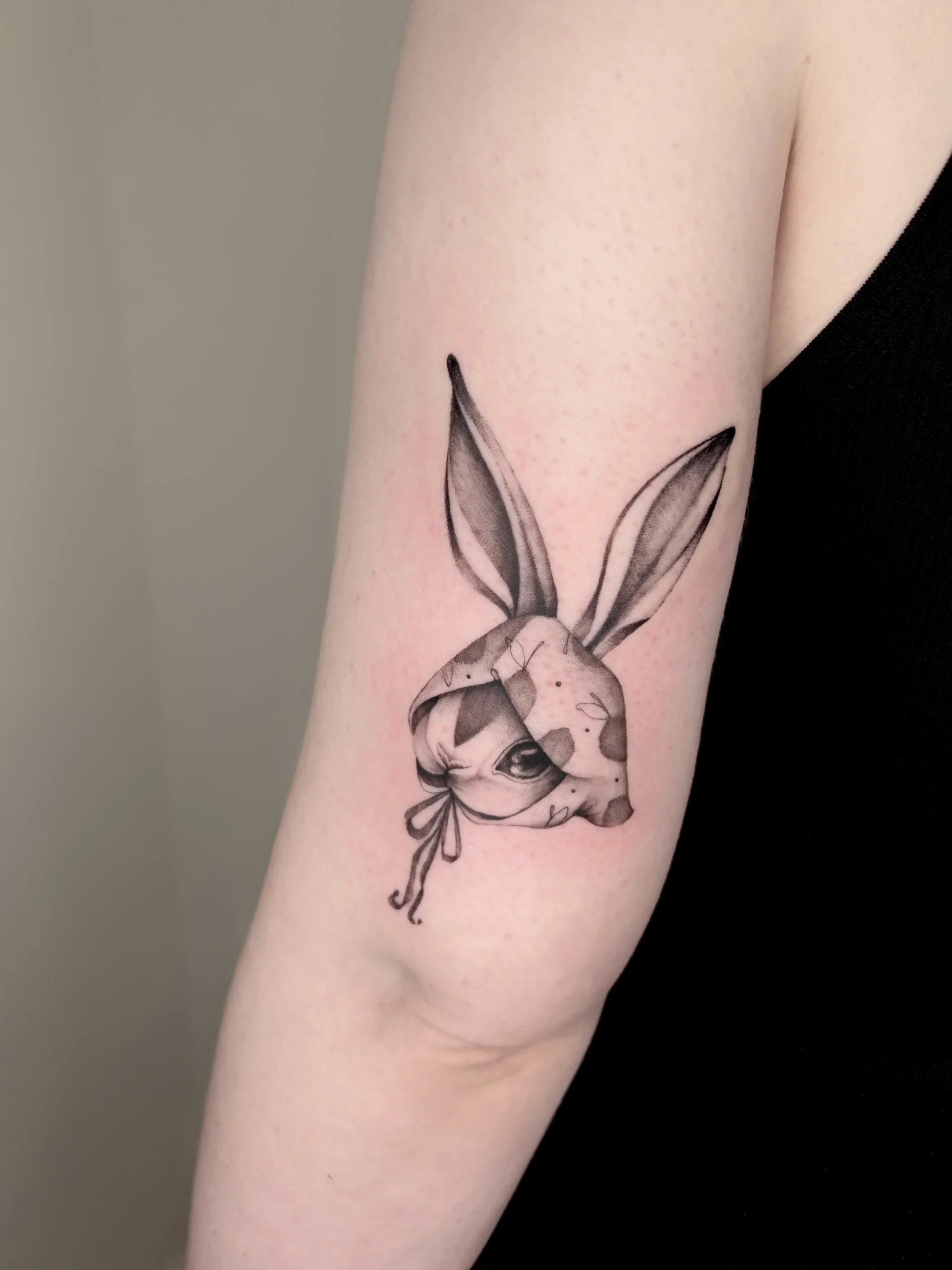 Fine line floral tattoo by Nathalia Coelho at XOXO Tattoo Dublin