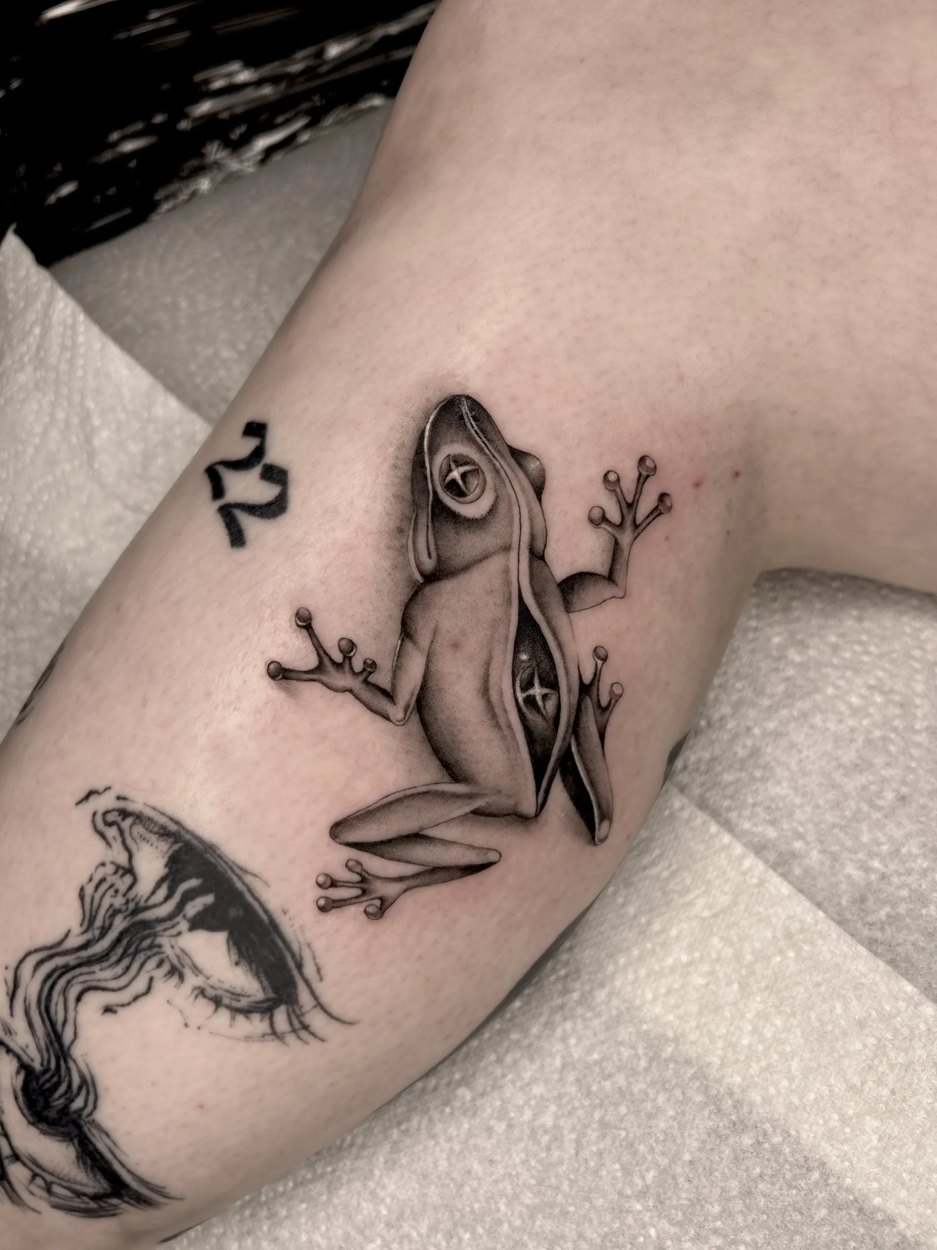 Black and grey botanical tattoo at XOXO Dublin