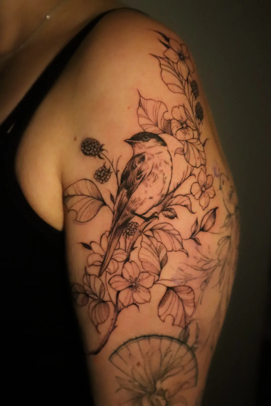 Black and grey detail tattoo at XOXO Dublin