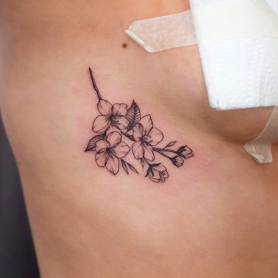Colour floral tattoo at XOXO Dublin