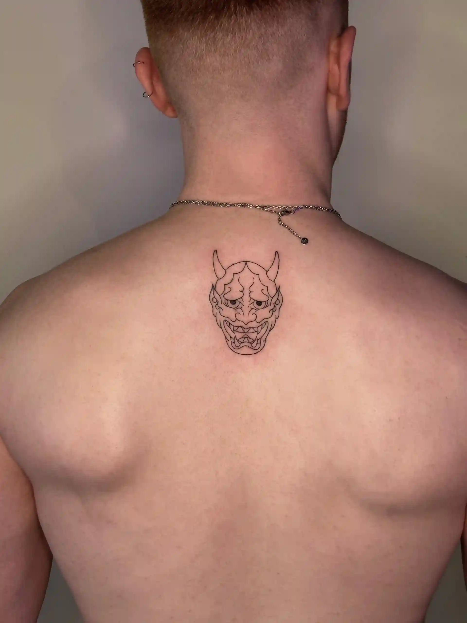 Intricate blackwork back tattoo piece.