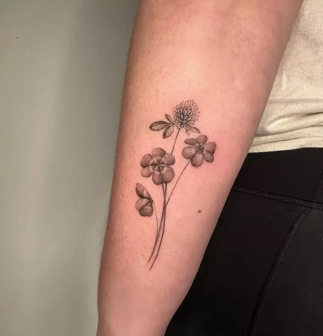 Delicate floral tattoo by Leonardo Cardenas at XOXO Dublin
