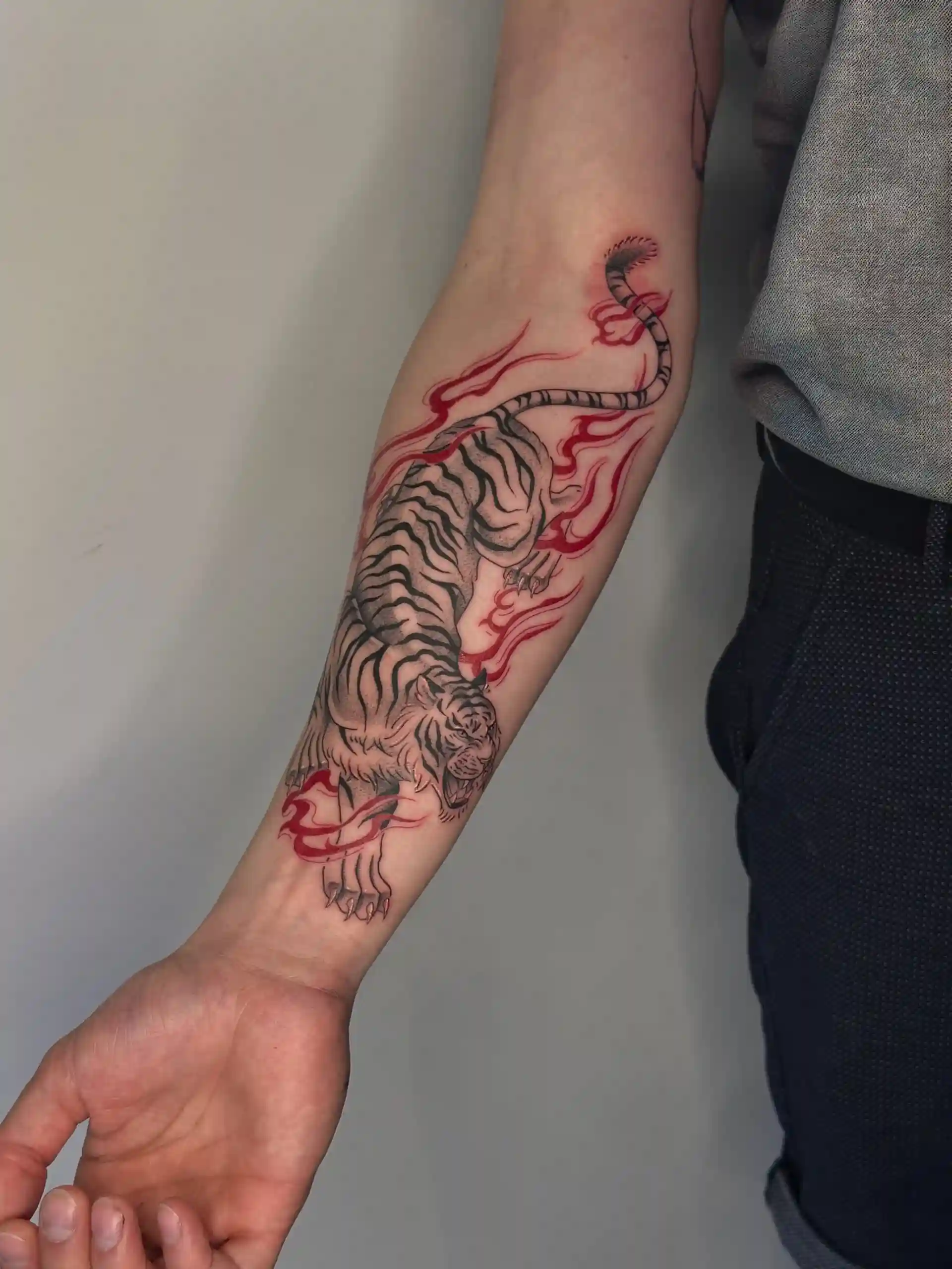 Bold oriental tiger tattoo.