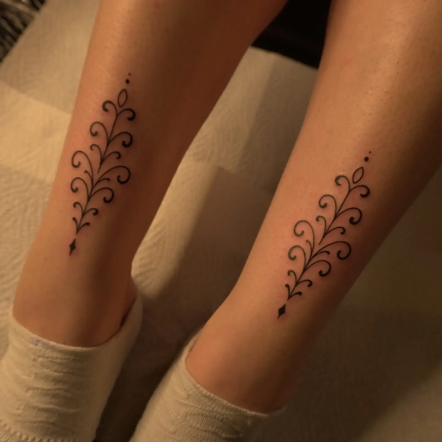 Ornamental swirl vine tattoo by Christine Bevilaqua, XOXO Tattoo Dublin