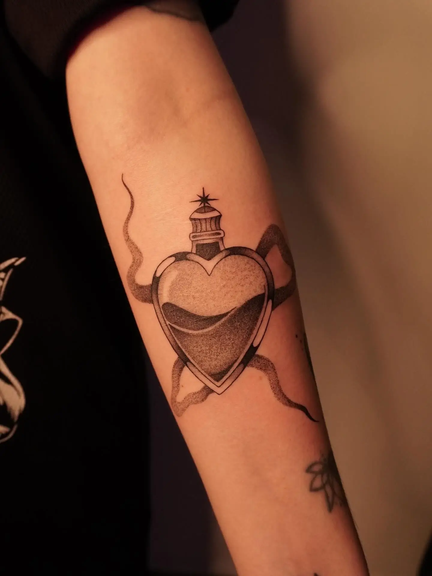 Traditional heart potion bottle tattoo by Christine Bevilaqua, XOXO Dublin