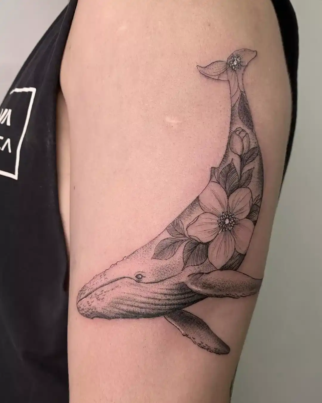 Black and grey floral tattoo at XOXO Dublin